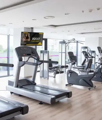 Learn More about <h3>Gym and <br> Fitness</h3> <p>Next-Level Fitness Running Screens and Content Automation</p>